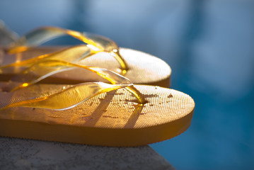 flipflopls by the pool.