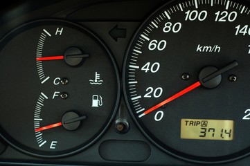 Fototapeta premium car dashboard with speed, temperature and fuel