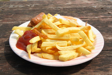 sausage, egg and chips from a uk roadside cafe.