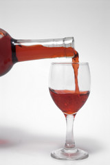 pouring a glass of wine