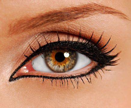 woman close-up eye. false lashes. liner.