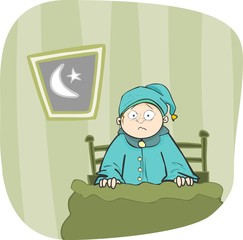 boy woke up from a terrible nightmare in his bed