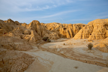 arid earth over the blue sky