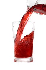 pouring fresh strawberry  juice