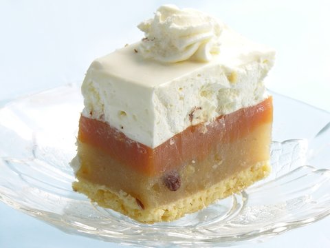 fruit-cake with apples and white-cream