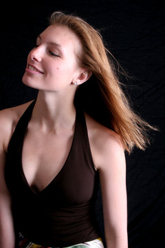 pretty woman smiling looking left