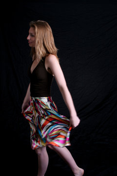 pretty woman walking to the left