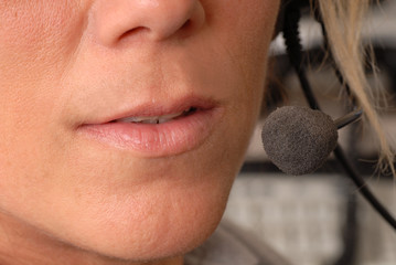 Naklejka premium close up of police dispatcher's mouth