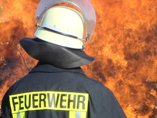 firefighter and flames