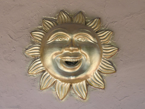 painted sun face