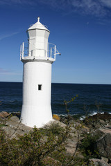 Fototapeta na wymiar lighthouse in kivik , scania, southern sweden