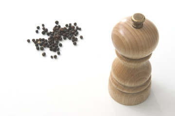 pepper mill with peppercorns
