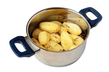 potatoes in cooker on white background