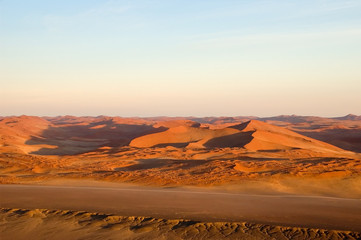 Aerial over red sand dunes