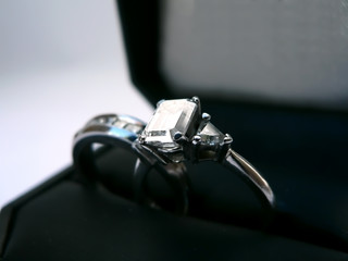 Fototapeta na wymiar wedding ring and band - diamond and platinum in case