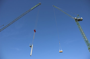 Obraz premium construction cranes