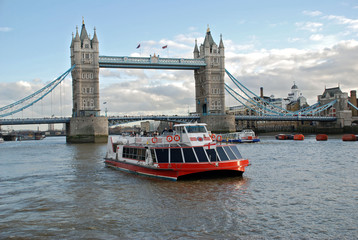 cruise boat and the tower bridge