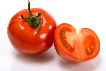 red tomatoes on a white background
