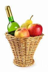 bottle of wine and fruit in basket