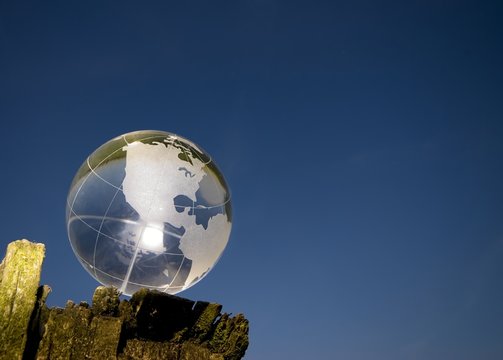 crystal globe over blue sky