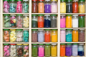 herbs and colored powder