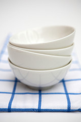 white bowls, blue towel
