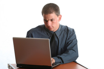 young male working on laptop