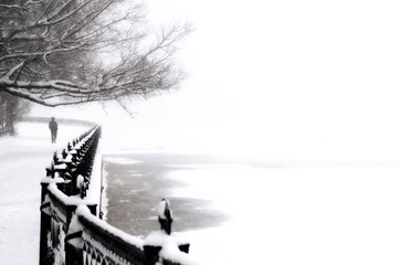 embankment at snowfall in Saint Petersburg, Russia