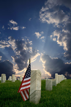 national cemetery with american flag