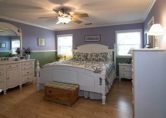 bedroom with bed and dressers