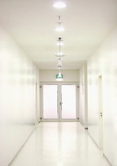 a meticulously clean white corridor