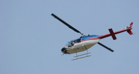 red white and blue helicopter