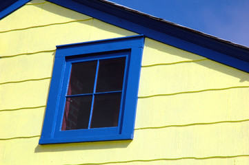 yellow house, blue trim