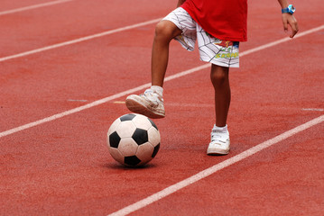 boy playing football