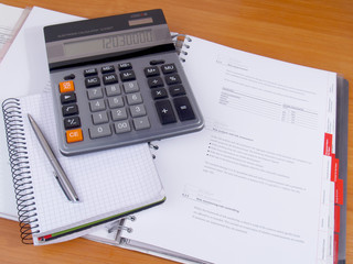 business calculator and annual report