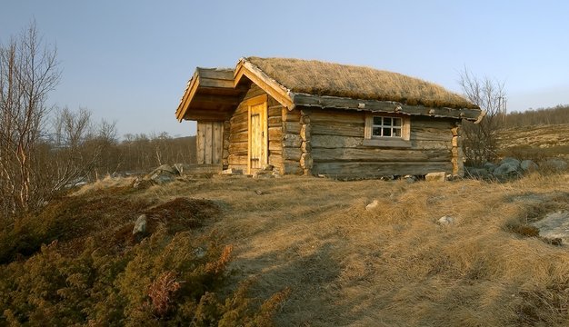 sunset - wooden house in norway