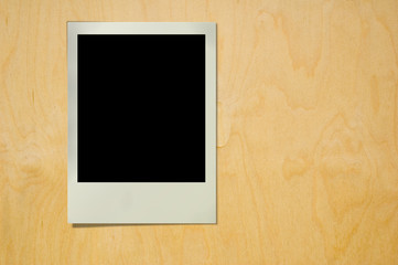polaroid on wood texture
