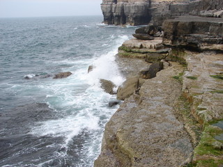 angry sea hitting rocks