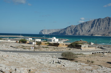 a fishing village, a mountain and the indian ocean