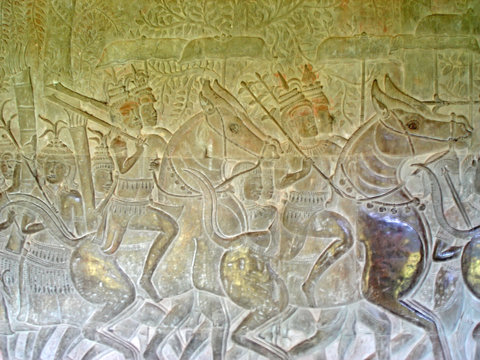 khmer warriors sculpted on a stone wall, angkor vat, angkor temp