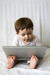 cute baby girl with laptop