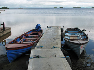 two boats by pier