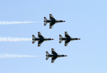 a fighter formation at an air show