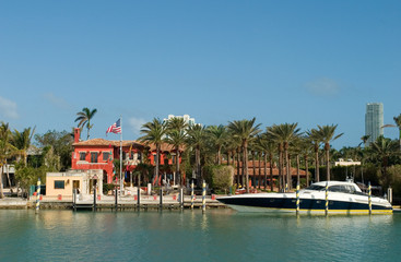 mansion with big race boat