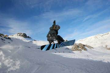 jumping snowboarder