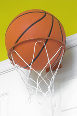 Fototapeta na wymiar basketball in small hoop