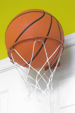 basketball in small hoop