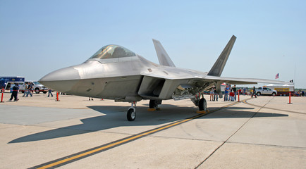 the fighter f-22 displayed at an air show