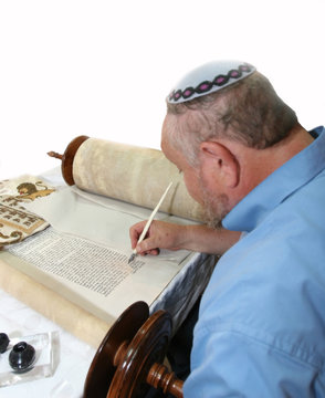 a man writing bible