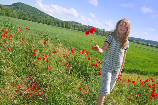 happy girl in poppy's land